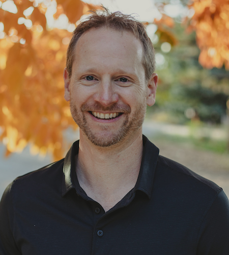 Picture of David Wiese in front of fall foliage