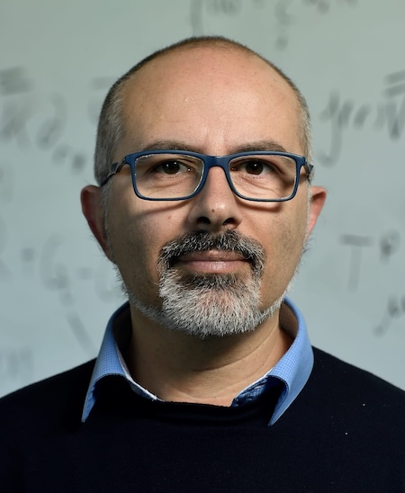 Picture of Emanuele Berti with an out of focus
			    whiteboard in the background