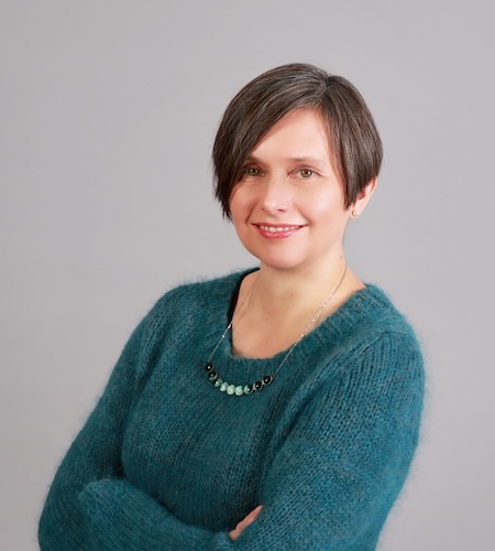 Picture of Laura Blecha with a light grey background