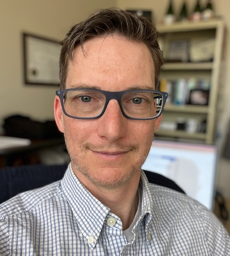 Picture of Tyson Littenberg inside an office
				    setting